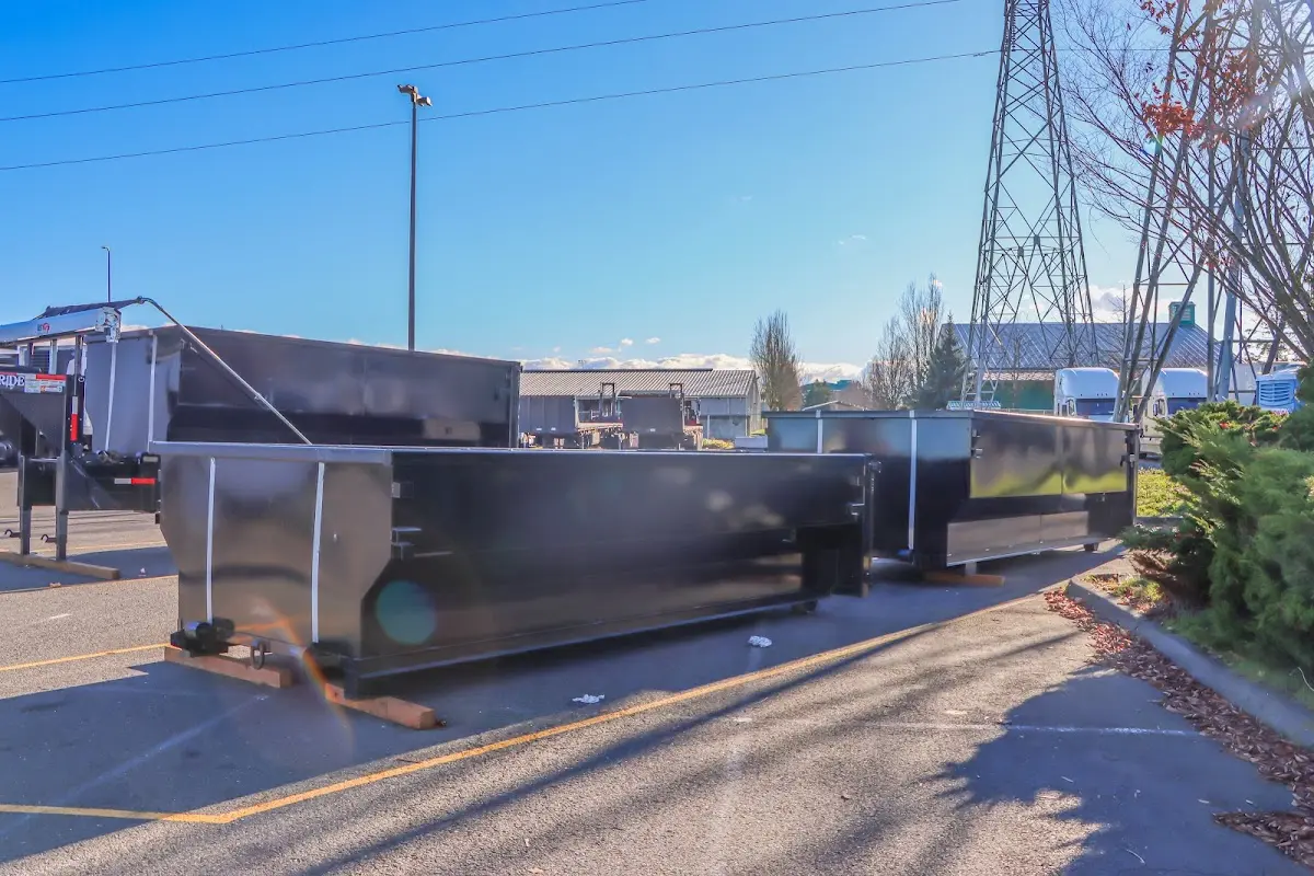 Roll-off dumpster ready for waste disposal at job site for Demolition Dumpster Rental in Portsmouth